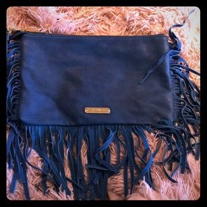 Gently used Steve Madden clutch..